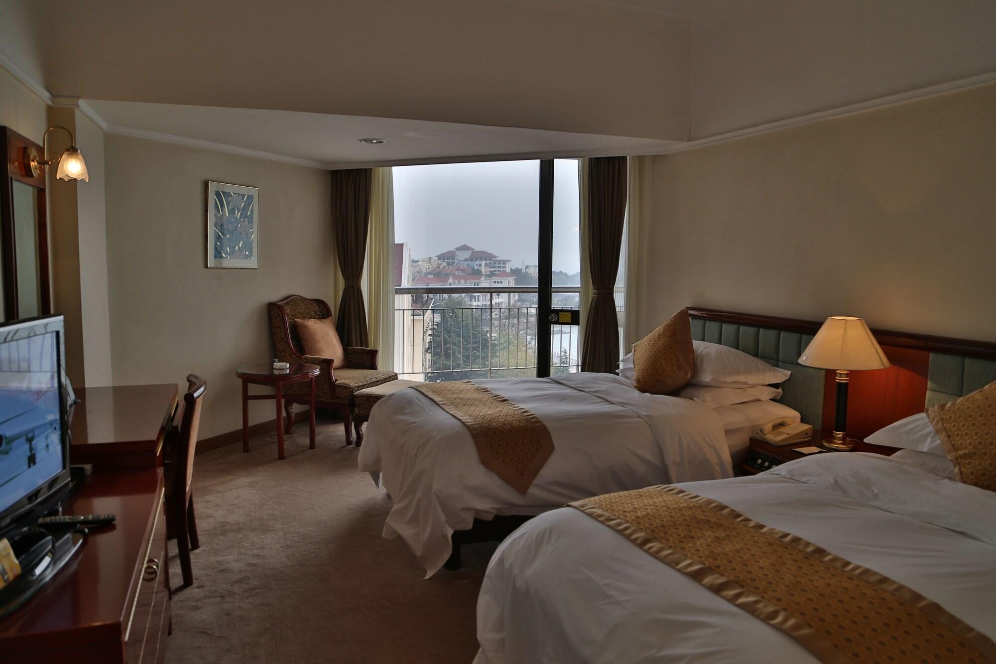 Huiquan Dynasty Hotel Qingdao Exterior foto